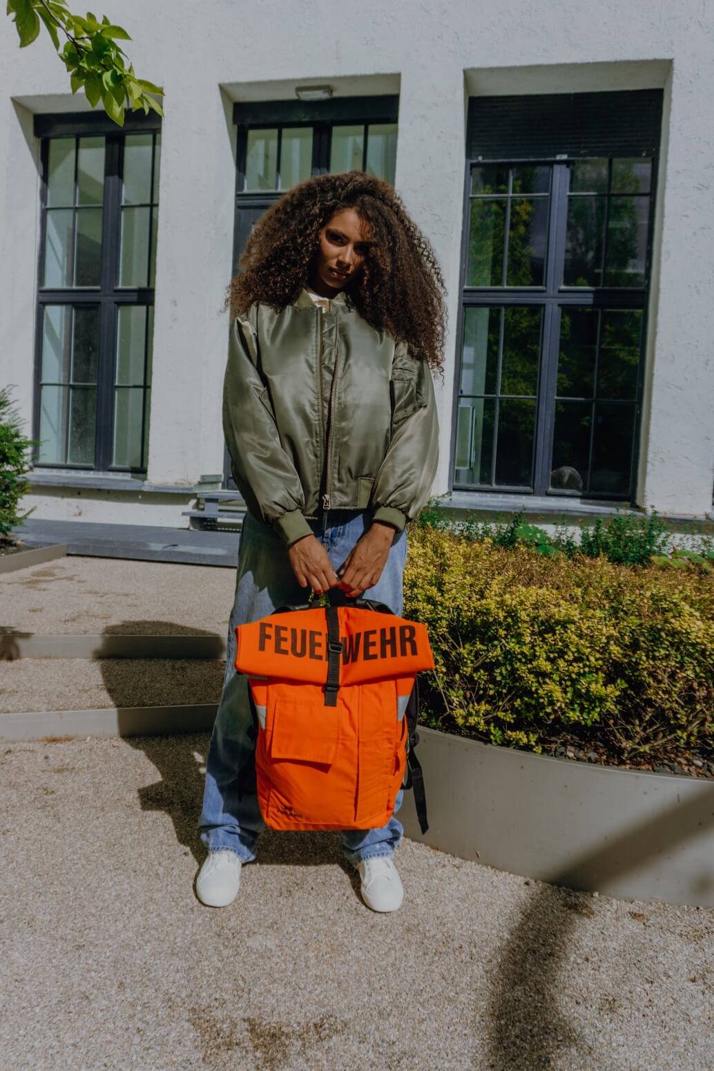 Rolltop Rucksack orange aus upgecycelter Feuerwehrkleidung 63x27x17cm